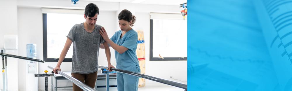 Man in physical therapy being assisted by a clinician (decorative image)